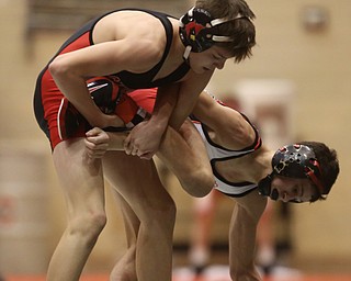 Canfield 106 pound wrestler Ethan Fletcher grabs onto Wauseon 106 pound wrestler Damon Molina's leg in the semi finals of the OHSAA State Wrestling Dual Team Tournament, Sunday, Feb. 11, 2018, at Ohio State University's St. John Arena in Columbus...(Nikos Frazier | The Vindicator)