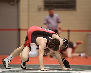 Wauseon 126 pound wrestler Nolan Ray hands onto Canfield 126 pound wrestler McCoy Watkins in the semi finals of the OHSAA State Wrestling Dual Team Tournament, Sunday, Feb. 11, 2018, at Ohio State University's St. John Arena in Columbus...(Nikos Frazier | The Vindicator)