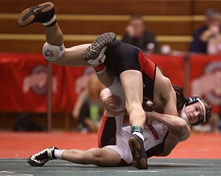 Wauseon 126 pound wrestler Nolan Ray flips Canfield 126 pound wrestler McCoy Watkins onto the mat in the semi finals of the OHSAA State Wrestling Dual Team Tournament, Sunday, Feb. 11, 2018, at Ohio State University's St. John Arena in Columbus...(Nikos Frazier | The Vindicator)