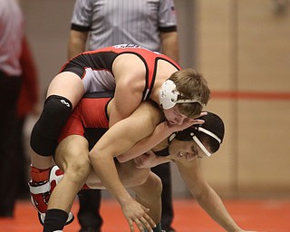 Wauseon 138 pound wrestler Jarrett Bischoff hangs onto Canfield 138 pound wrestler Eric El-Hayek in the semi finals of the OHSAA State Wrestling Dual Team Tournament, Sunday, Feb. 11, 2018, at Ohio State University's St. John Arena in Columbus...(Nikos Frazier | The Vindicator)