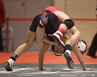 Wauseon 138 pound wrestler Jarrett Bischoff hangs onto Canfield 138 pound wrestler Eric El-Hayek in the semi finals of the OHSAA State Wrestling Dual Team Tournament, Sunday, Feb. 11, 2018, at Ohio State University's St. John Arena in Columbus...(Nikos Frazier | The Vindicator)