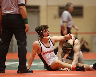 Wauseon 152 pound wrestler Gage Grunden reacts to an official's ruling while wrestling Canfield 152 pound wrestler David Reinhart in the semi finals of the OHSAA State Wrestling Dual Team Tournament, Sunday, Feb. 11, 2018, at Ohio State University's St. John Arena in Columbus...(Nikos Frazier | The Vindicator)