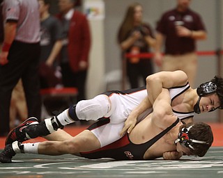 Wauseon 160 pound wrestler Sandro Ramirez attempts to pin Canfield 160 pound wrestler Ben Cutrer in the semi finals of the OHSAA State Wrestling Dual Team Tournament, Sunday, Feb. 11, 2018, at Ohio State University's St. John Arena in Columbus...(Nikos Frazier | The Vindicator)