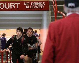 The Canfield wrestling team, including Tyler Stein(center) exits the arena floor after loosing to Wauseon, 33-28, in the semi finals of the OHSAA State Wrestling Dual Team Tournament, Sunday, Feb. 11, 2018, at Ohio State University's St. John Arena in Columbus...(Nikos Frazier | The Vindicator)