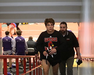 Canfield wrestler Anthony D'Alesio and head coach Stephen Pitts exit the arena floor after loosing to Wauseon, 33-28, in the semi finals of the OHSAA State Wrestling Dual Team Tournament, Sunday, Feb. 11, 2018, at Ohio State University's St. John Arena in Columbus...(Nikos Frazier | The Vindicator)