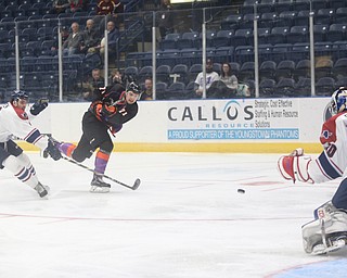 Youngstown Phantoms forward Samuel Salonen (71) scores a goal past Central Illinois Flying Aces goalie Ryan Snowden (30)  as Central Illinois Flying Aces defenseman Corson Green (9) in the second period of an USHL hockey game, Tuesday, Feb. 13, 2018, in Youngstown...(Nikos Frazier | The Vindicator)