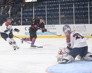 Youngstown Phantoms forward Samuel Salonen (71) scores a goal past Central Illinois Flying Aces goalie Ryan Snowden (30)  as Central Illinois Flying Aces defenseman Corson Green (9) in the second period of an USHL hockey game, Tuesday, Feb. 13, 2018, in Youngstown...(Nikos Frazier | The Vindicator)
