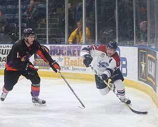 Youngstown Phantoms forward Tommy Parottino (9) steals the puck from Central Illinois Flying Aces left wing Calen Kiefiuk (13)  in the second period of an USHL hockey game, Tuesday, Feb. 13, 2018, in Youngstown...(Nikos Frazier | The Vindicator)