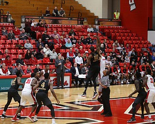 Youngstown State forward Devin Haygood (2) and Oakland forward Isaiah Brock (10) go up for the tip off in the first half of an NCAA Horizon League college basketball game, Wednesday, Feb. 14, 2018, in Youngstown. YSU won 75-73...(Nikos Frazier | The Vindicator)