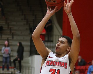 Youngstown State forward Michael Akuchie (31) goes up for three in the first half of an NCAA Horizon League college basketball game, Wednesday, Feb. 14, 2018, in Youngstown. YSU won 75-73...(Nikos Frazier | The Vindicator)