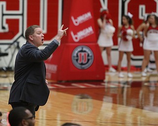 Youngstown State head coach Jerrod Calhoun calls out a play in the first half of an NCAA Horizon League college basketball game, Wednesday, Feb. 14, 2018, in Youngstown. YSU won 75-73...(Nikos Frazier | The Vindicator)