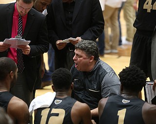 Oakland head coach Greg Kampe talks to his players during a media timeout in the first half of an NCAA Horizon League college basketball game, Wednesday, Feb. 14, 2018, in Youngstown. YSU won 75-73...(Nikos Frazier | The Vindicator)