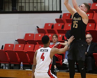 Oakland forward Chris Palombizio (15) goes up for three over Youngstown State guard Jaylen Benton (4) in the first half of an NCAA Horizon League college basketball game, Wednesday, Feb. 14, 2018, in Youngstown. YSU won 75-73...(Nikos Frazier | The Vindicator)