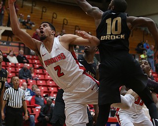 Youngstown State forward Devin Haygood (2) watches as his layup is blocked by Oakland forward Isaiah Brock (10) in the second half of an NCAA Horizon League college basketball game, Wednesday, Feb. 14, 2018, in Youngstown. YSU won 75-73...(Nikos Frazier | The Vindicator)