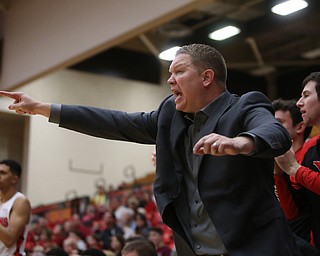 Youngstown State head coach Jerrod Calhoun calls out a play in the second half of an NCAA Horizon League college basketball game, Wednesday, Feb. 14, 2018, in Youngstown. YSU won 75-73...(Nikos Frazier | The Vindicator)