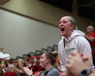 Youngstown State guard McKenah Peters (34) reacts to Youngstown State forward Tyree Robinson (0)'s put back dunk in the second half of an NCAA Horizon League college basketball game, Wednesday, Feb. 14, 2018, in Youngstown. YSU won 75-73...(Nikos Frazier | The Vindicator)