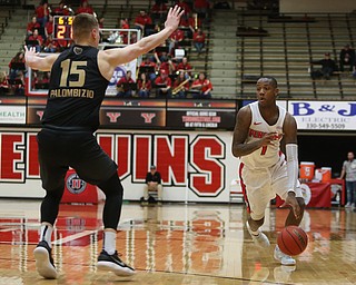 Youngstown State guard Braun Hartfield (1) drives towards Oakland forward Chris Palombizio (15) in the second half of an NCAA Horizon League college basketball game, Wednesday, Feb. 14, 2018, in Youngstown. YSU won 75-73...(Nikos Frazier | The Vindicator)