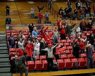 Spectators react to Youngstown State guard Garrett Covington (32)'s buzzer beater basket in the second half of an NCAA Horizon League college basketball game, Wednesday, Feb. 14, 2018, in Youngstown. YSU won 75-73...(Nikos Frazier | The Vindicator)