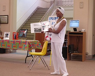 Neighbors | Zack Shively.Pearlette Wigley did a presentation on Simone Manuel, the first African American woman to win an individual Olympic Gold Medal. Wigley explained the history behind Manuel's historic win in the 100-meter freestyle.