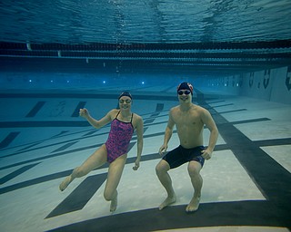 Jake Lawrence and Gia Direnzo pose for a photo, Wednesday, Feb. 14, 2018, at the Youngstown State University Natatorium in Youngstown...(Nikos Frazier | The Vindicator)