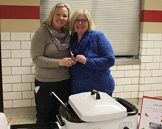Neighbors | Abby Slanker.The mother-daughter team of Beth Schutz and Sabrina Eaton took home the top prize in the Unconventional category at the Committee to Support Canfield Schools second annual Cardinal Chili Cook-off on Feb. 9.