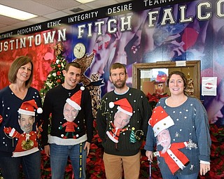 Neighbors | Submitted.The Fitch school staff got involved in the spirit week as well. Pictured, the art department of the high school celebrated "Ugly Sweater Day" by wearing sweaters with the faces of the Fitch principals on them.