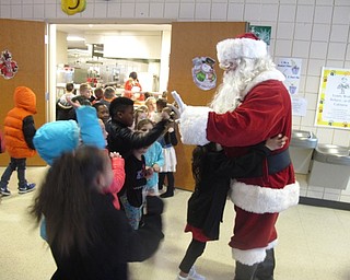 Neighbors | Zack Shively.Santa gave the students in the school a book, a jingle bell and a necklace. The PTA invites Santa to the elementary school every year.