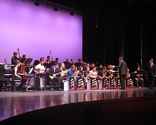 Neighbors | Zack Shively.The Jazz Ensemble 3 played three songs. The group, unlike the other ensembles, practice voluntarily outside of school hours. Pictured, the band performed a rendition of James Taylor's "How Sweet It Is (to Be Loved By You)" with James Jama singing the song.
