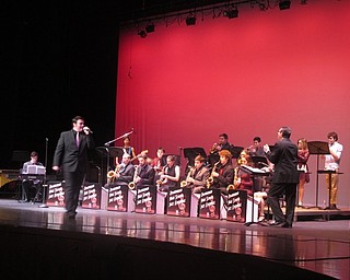Neighbors | Zack Shively.Jazz Ensemble 2 played five songs, including a Christmas medley called "Have a Cool Yule!" Pictured, the band performs "Burnin' Down the House" By Talking Heads with Patrick Kale singing. The arragement was based on David Byrne and St. Vincent's version of the song.