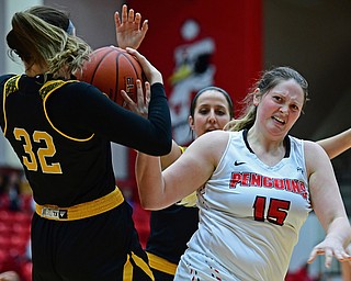 YOUNGSTOWN, OHIO - FEBRUARY 15, 2018: Youngstown State's Mary Dunn has the ball ripped away by Milwaukee's Steph Kostowicz during the first half of their game on Thursday night at Beeghly Center. DAVID DERMER | THE VINDICATOR