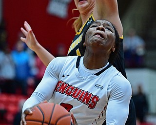 YOUNGSTOWN, OHIO - FEBRUARY 15, 2018: Youngstown State's Indiya Benjamin goes to the basket against Milwaukee's Bailey Farley during the second half of their game, Thursday night. Youngstown State won in overtime 86-85. DAVID DERMER | THE VINDICATOR..This shot would tie the game and help force overtime.