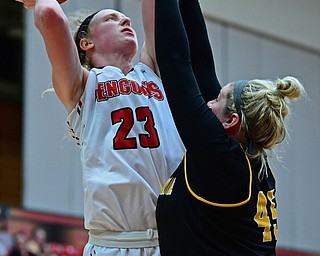 YOUNGSTOWN, OHIO - FEBRUARY 15, 2018: Youngstown State's Sarah Cash shoots over Milwaukee's Lizzie Odegard in overtime of their game, Thursday night. Youngstown State won in overtime 86-85. DAVID DERMER | THE VINDICATOR..This would be the game winning basket.