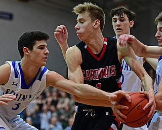 POLAND, OHIO - FEBRUARY 16, 2018: Canfield's Aydin Hanousek attempts to pass while Poland's Billy Orr, right, and Braden O'Shaughnessy fight to rip the ball from his control during the second half of their game on Friday night at Poland Seminary High School. DAVID DERMER | THE VINDICATOR..Poland's Dan Kramer pictured.