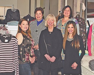 Mahoning County Medical Society Alliance will host its 14th annual champagne brunch and fashion show March 9 at Mr. Anthony’s in Boardman. At right, front row from left, are Diana McDonald, Suzanne Kessler and Christina Memo, committee members. In back, from left, are Paula Jakubek and Tammy Engle, co-chairwomen.