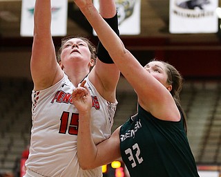 YOUNGSTOWN, OHIO - FEBRUARY 17, 2018: YSU Penguins'Mary Dunn (15) battles for the rebound with Green Bay Phoenix's Karly Murphy (32) during the 1st qtr. at Beeghly Center, YSU, Youngstown, OH.  MICHAEL G. TAYLOR | THE VINDICATOR