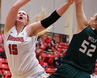YOUNGSTOWN, OHIO - FEBRUARY 17, 2018: YSU Penguins'Mary Dunn (15) battles for the rebound with Green Bay Phoenix's Madison Wolf (52) during the 1st qtr. at Beeghly Center, YSU, Youngstown, OH.  MICHAEL G. TAYLOR | THE VINDICATOR