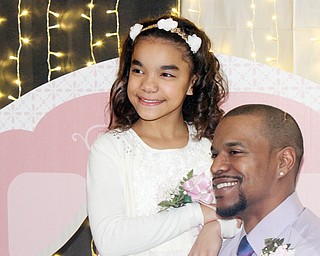 William D. Lewis The Vindicator  Ryan Adams and his daughter RamaniAdams, 10, share a moment during 2-17-18 Daddy Daughter Dance at Boardman Park.