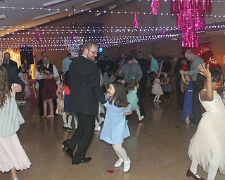 William D. Lewis The Vindicator Dads and daughters dance the night away during 2-17-18 Daddy Daughter Dance at Boardman Park.