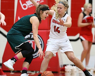 YOUNGSTOWN, OHIO - FEBRUARY 17, 2018: YSU Penguins' Melinda Trimmer (14) applies the defense to Green Bay Phoenix's Laken James (5) during the 2nd qtr. at Beeghly Center, YSU, Youngstown, OH.  MICHAEL G. TAYLOR | THE VINDICATOR.
