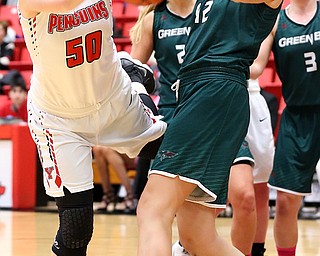 YOUNGSTOWN, OHIO - FEBRUARY 17, 2018: YSU Penguins' Anne Secrest (50) battle for the ball with Green Bay Phoenix's Mackensie Wolf (42) during the 4th qtr. at Beeghly Center, YSU, Youngstown, OH.  MICHAEL G. TAYLOR | THE VINDICATOR