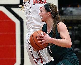 YOUNGSTOWN, OHIO - FEBRUARY 17, 2018: YSU Penguins' Melinda Trimmer (14) pressures Green Bay Phoenix's Frankie Wurtz (3) during the 4th qtr. at Beeghly Center, YSU, Youngstown, OH.  MICHAEL G. TAYLOR | THE VINDICATOR