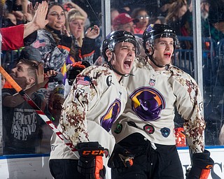 Scott R. Galvin | The Vindicator.Youngstown Phantoms left wing Joey Abate (17) celebrates his goal as defenseman Jason Smallidge, right, congratulates him during the second period against the Waterloo Black Hawks at the Covelli Centre on Saturday, February 17, 2018.