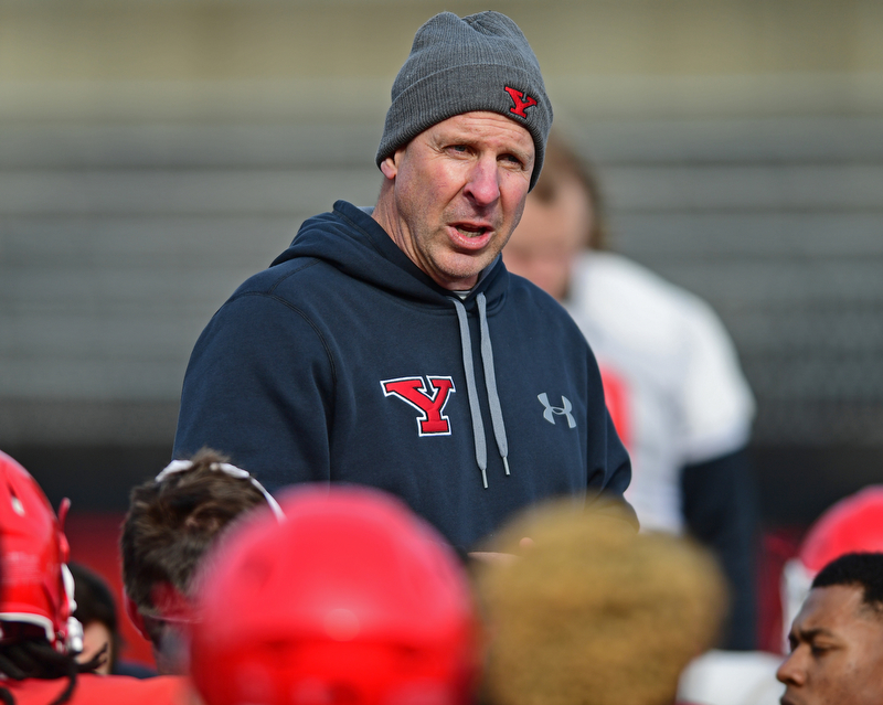 YOUNGSTOWN, OHIO - FEBRUARY 18, 2018: Youngstown State head coach Bo Pelini addresses the team after the teams practice on Sunday afternoon at Stambaugh Stadium. DAVID DERMER | THE VINDICATOR