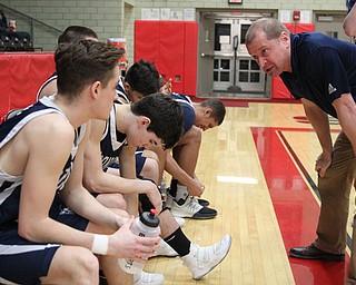 McDonald head coach Jeff Rasile talks to his team before the start of Tuesday nights matchup at Struthers Field House.  Dustin Livesay  |  The Vindicator  2/20/18 Struthers