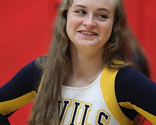 McDonald senior cheerleader Bailey Conley cheers on the sidelines during the second half of Tuesday nights matchup at Struthers Field House.  Dustin Livesay  |  The Vindicator  2/20/18 Struthers