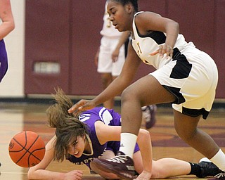 William D Lewis The Vindicator  Liberty's Delia Watson(5) drives around Heartland's JJulia Reynolds(32) during 2-21-18 action at Liberty.