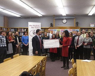 Neighbors | Zack Shively.Boardman successfully funded eight educational projects to be used throughout the district. Pictured, Bill Amendol of the Boardman Education Association presents a check to Joyce Mitovich, president of Boardman Schools Fund for Educational Excellence.