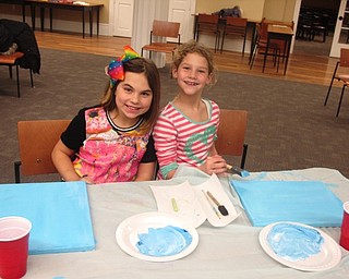 Neighbors | Zack Shively.Children had a painting party at the Poland library on Jan. 22. Pictured, Gina Romeo and Adelynn Rudge began their paintings by painting the canvas blue.