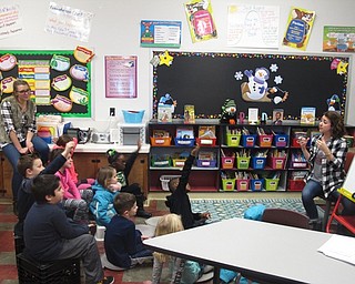 Neighbors | Zack Shively.The parents at Market Street Elementary's Literacy Night learned a number of new strategies for helping their children succeed. Pictured, teachers Tara Alberti and Kendra Baltes went over some guided reading techniques.
