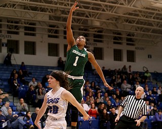 Ursuline's Dayshonette Harris (1) goes up for a layup over Poland guard Marlie McConnell (20) in the third quarter of an Division II sectional final high school basketball game, Thursday, Feb. 22, 2018, in Poland. Poland won 50-49...(Nikos Frazier | The Vindicator)